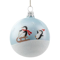 Glaskugel blau opal mit Pinguine auf Schlitten, 7 cm Best